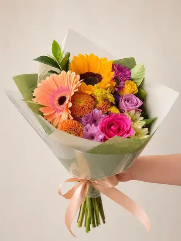 Buquê colorido com girassol, gérbera e rosas